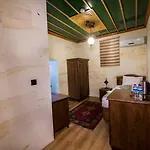 Cappadocia Ozbek Stone House فندق غوريمِيه